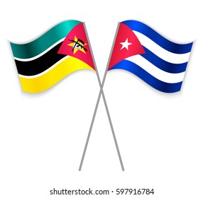 Mozambican and Cuban crossed flags. Mozambique combined with Cuba isolated on white. Language learning, international business or travel concept.