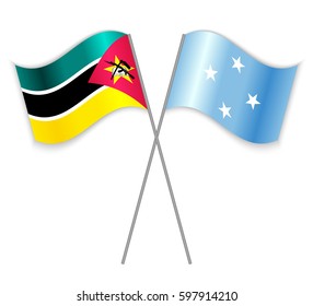Mozambican and Micronesian crossed flags. Mozambique combined with Micronesia isolated on white. Language learning, international business or travel concept.