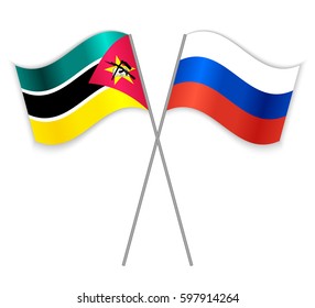 Mozambican and Russian crossed flags. Mozambique combined with Russia isolated on white. Language learning, international business or travel concept.