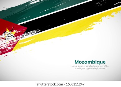Mozambique flag made in brush stroke background. National day of Mozambique. Creative Mozambique national country flag icon. Abstract painted grunge style brush flag background.