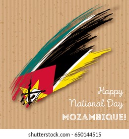 Mozambique Independence Day Patriotic Design. Expressive Brush Stroke in National Flag Colors on kraft paper background. Happy Independence Day Mozambique Vector Greeting Card.