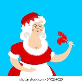 Mrs. Claus isolated. Wife of Santa. Christmas woman in red dress and white apron. Xmas grandmother in Bonnet
