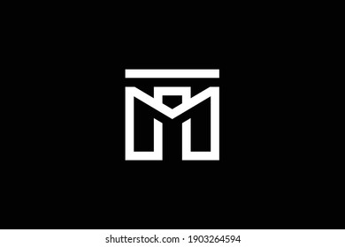 MT letter logo design on luxury background. TM monogram initials letter logo concept. MT icon design. TM elegant and Professional white color letter icon on black background.