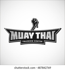 Muay Thai team logo. Training center emblem, logo, badge. Vector illustration with a fighter  for your t-shirt, gym, label, combat store and sticker design