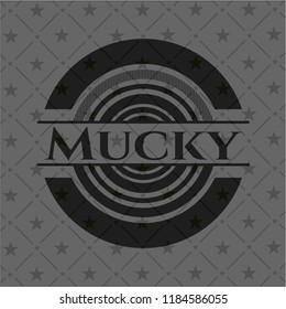 Mucky dark badge