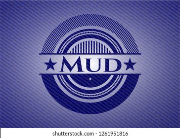 Mud emblem with jean background