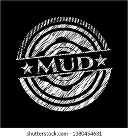 Mud written on a blackboard