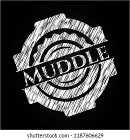 Muddle chalkboard emblem on black board