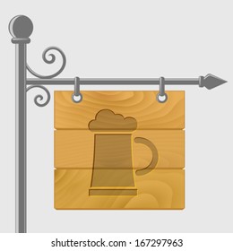Mug of beer cut out on a wooden signboard. EPS10.