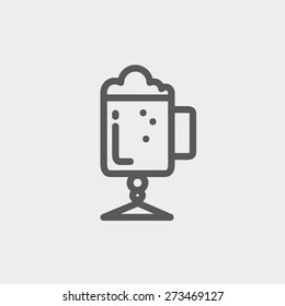 Mug of beer icon thin line for web and mobile, modern minimalistic flat design. Vector dark grey icon on light grey background.