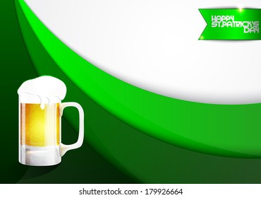 Mug of beer on a green background with an inscription Happy St. Patrick's Day