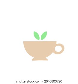 La taza es marrón con dos hojas verdes.