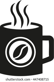 Mug with coffee and coffee bean