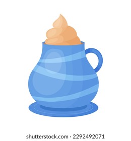 Mug of hot chocolate with whipped cream, in a blue mug, on a white background