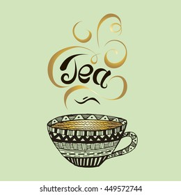 Mug in style bo-ho. Writing by hands a letterning in gold shades of the word tea.