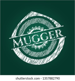 Mugger on blackboard