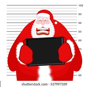 Mugshot Santa Claus at Police Department. Mug shot Christmas. Arrested Bad Santa holding black plate. Grandpa Photo Prisoner in custody for new year. offender portrait
