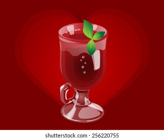 Mulled wine cocktail in shiny glass with mint
