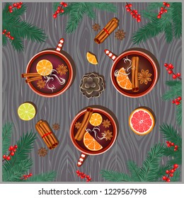 mulled wine on the table, spruce branches, cone, red berries, lemon, orange, cinnamon
