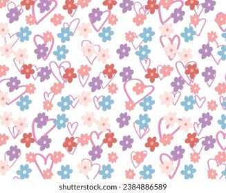 flores multicolores sobre fondo de corazones rosados