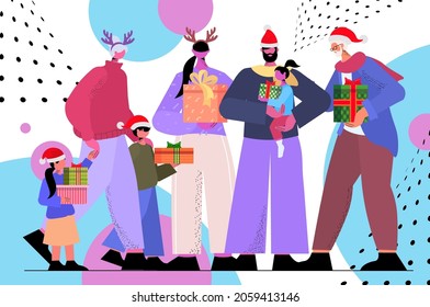multi generation family in festive hats holding wrapped gifts happy new year and merry christmas holidays celebration