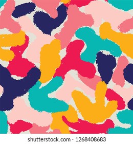 Multicolor bright seamless camo background. Flat abstract trendy vector wallpaper print. Seamless camouflage pattern. Military fashion design.
