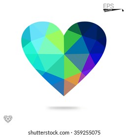 Multicolor heart isolated on white background. Geometric rumpled triangular low poly origami style gradient graphic illustration. Vector polygonal design for your business.