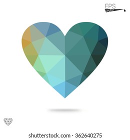 Multicolor heart isolated on white background. Geometric rumpled triangular low poly origami style gradient graphic illustration. Vector polygonal design for your business.