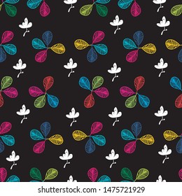 Multicolor leaf seamless pattern with white dots on dark background colorful pattern