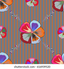 Multicolor ornament of small simple blue and green flowers, vector abstract seamless pattern for fabric or textile design.