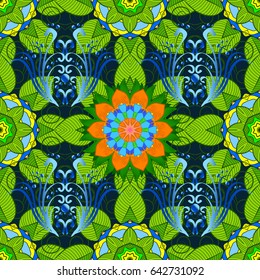 Multicolor ornament of small simple blue flowers, vector abstract seamless pattern for fabric or textile design.