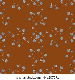 Multicolor ornament of small simple blue flowers, vector abstract seamless pattern for fabric or textile design.