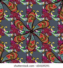 Multicolor ornament of small simple flowers, vector abstract seamless pattern for fabric or textile design.