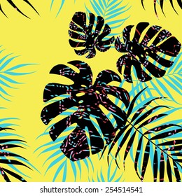 Multicolor palm tree foliage on yellow background