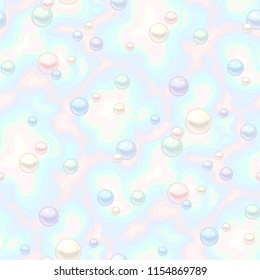 Multicolor round pearls on light nacre background. Abstract seamless pattern for textile and design
