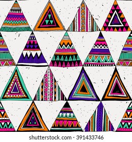 multicolor tribal Navajo vector seamless pattern with doodle triangles. aztec abstract geometric print. ethnic hipster backdrop. Wallpaper, cloth design, fabric, paper, cover, textile. Hand drawn