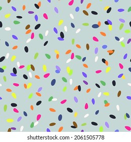 Multicolored abstract confetti seamless pattern. Bright colors tiny elements. Fun, party and celebration concept.