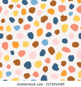 Multicolored abstract polka dot seamless repeat pattern. Random placed, irregular vector stains all over surface print on white background.