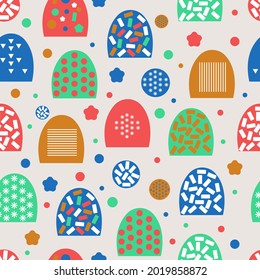 Multicolored abstract seamless pattern with circles, rings, ovals, rectangles, flowers, used for packaging, fabric, background and other products.