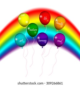 Multi-colored balloons on a background of rainbow