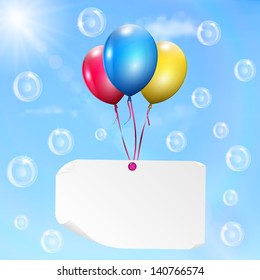 Multicolored balloons with paper card on sky background with sun, clouds and soap bubbles