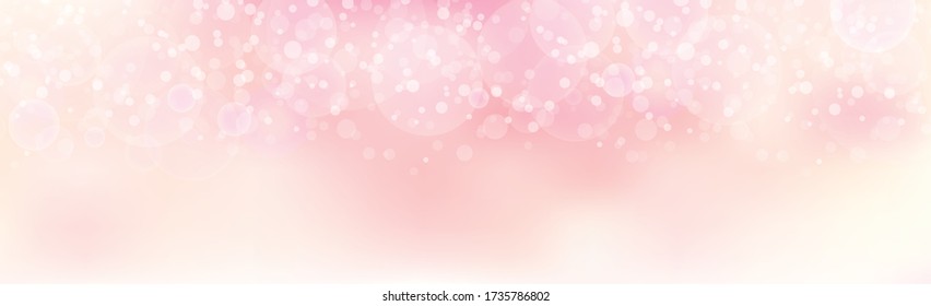 Multicolored blurry bokeh on a light background