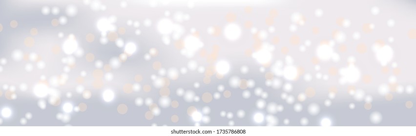 Multicolored blurry bokeh on a light background