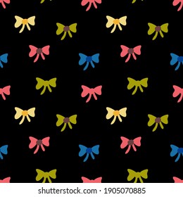 Multi-colored bows on a black background. Vector seamless pattern.