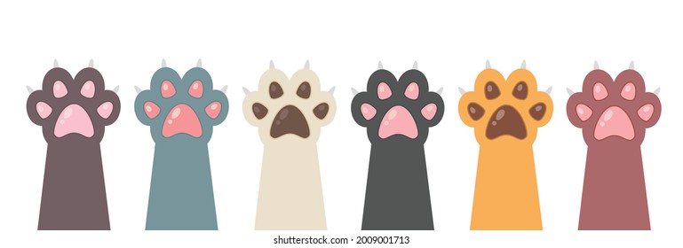 Multicolored cats paws isolated on white background. Cute feline paw in flat style. Animal paw. Vector stock