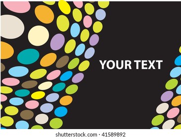 Multi-colored circles on dark background