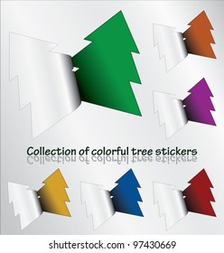 Multicolored collection of tree stickers revealing colorful background