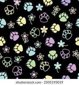 Multicolored dog paw prints and flowers on a black background, seamless vector pattern