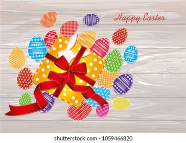 Multicolored easter eggs with pattern. A box with a gift tied with a red ribbon and a bow. An empty space for an advertising message. Greeting card. Free place. Vector on wooden background.