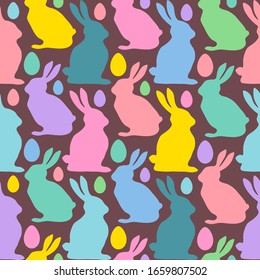 Multicolored Easter eggs and rabbits.  Seamless pattern. Texture for fabric, wrapping, wallpaper. Decorative print. Vector illustration .